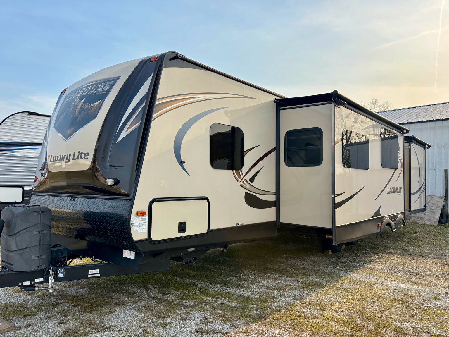 2017 Primetime Lacrosse Luxury Lite 318BHS travel trailer for sale at Triple C Camper Consignment in Kentuckiana — photo 1 of 12